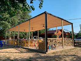 Люстра - вентилятор Mini Icaria old gold на летней веранде в Краснодарском крае